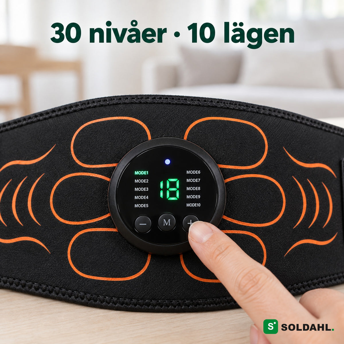 Närbild på magbältets kontroll med display, 30 nivåer och 10 lägen
