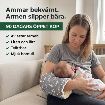 Mamma ammar med armkudden över underarmen, 90 dagars öppet köp