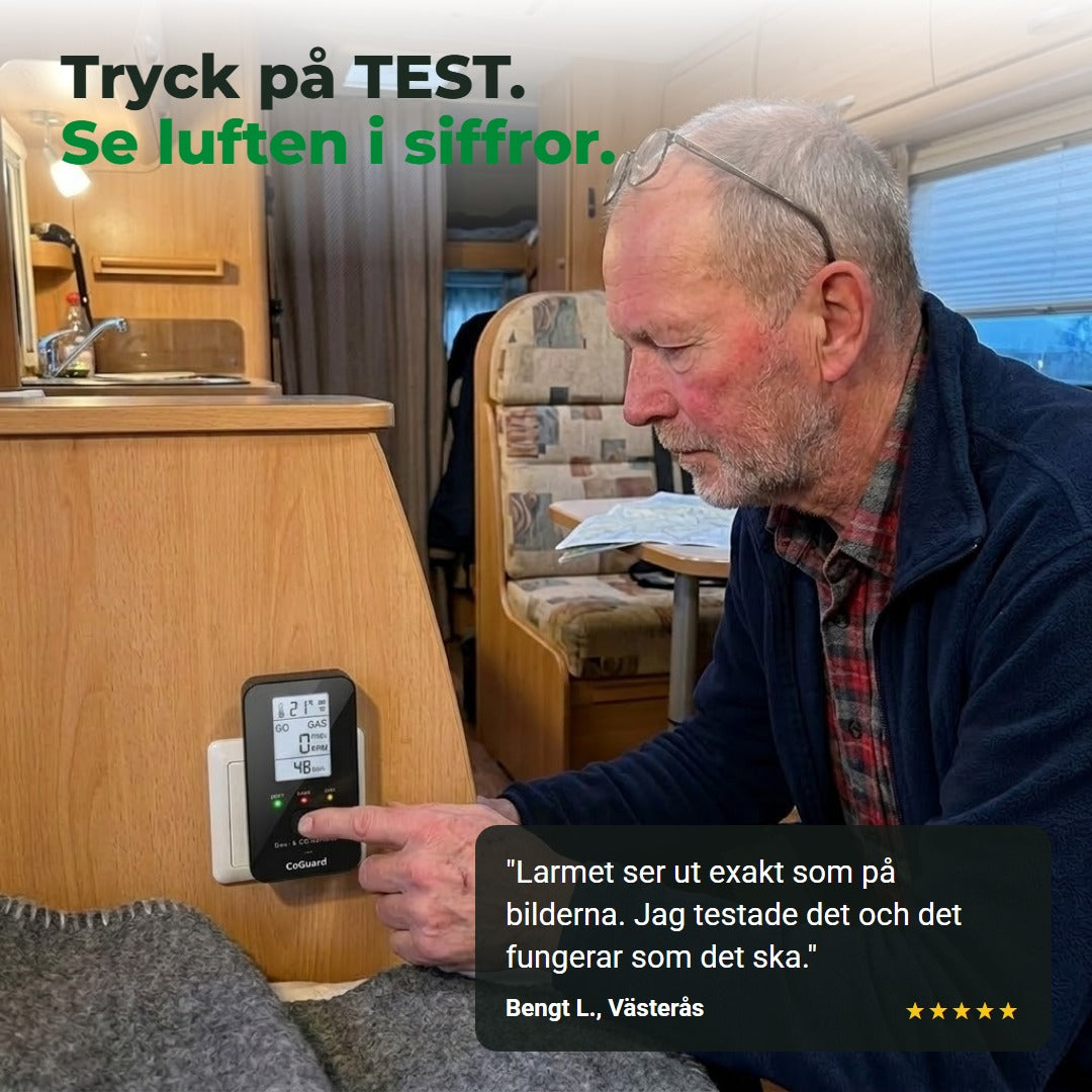 Göran trycker på TEST-knappen på CoGuard i husbilen