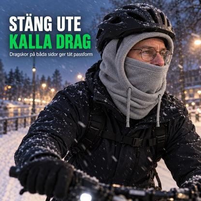 Vintercyklist med grå FrostGuard under cykelhjälmen